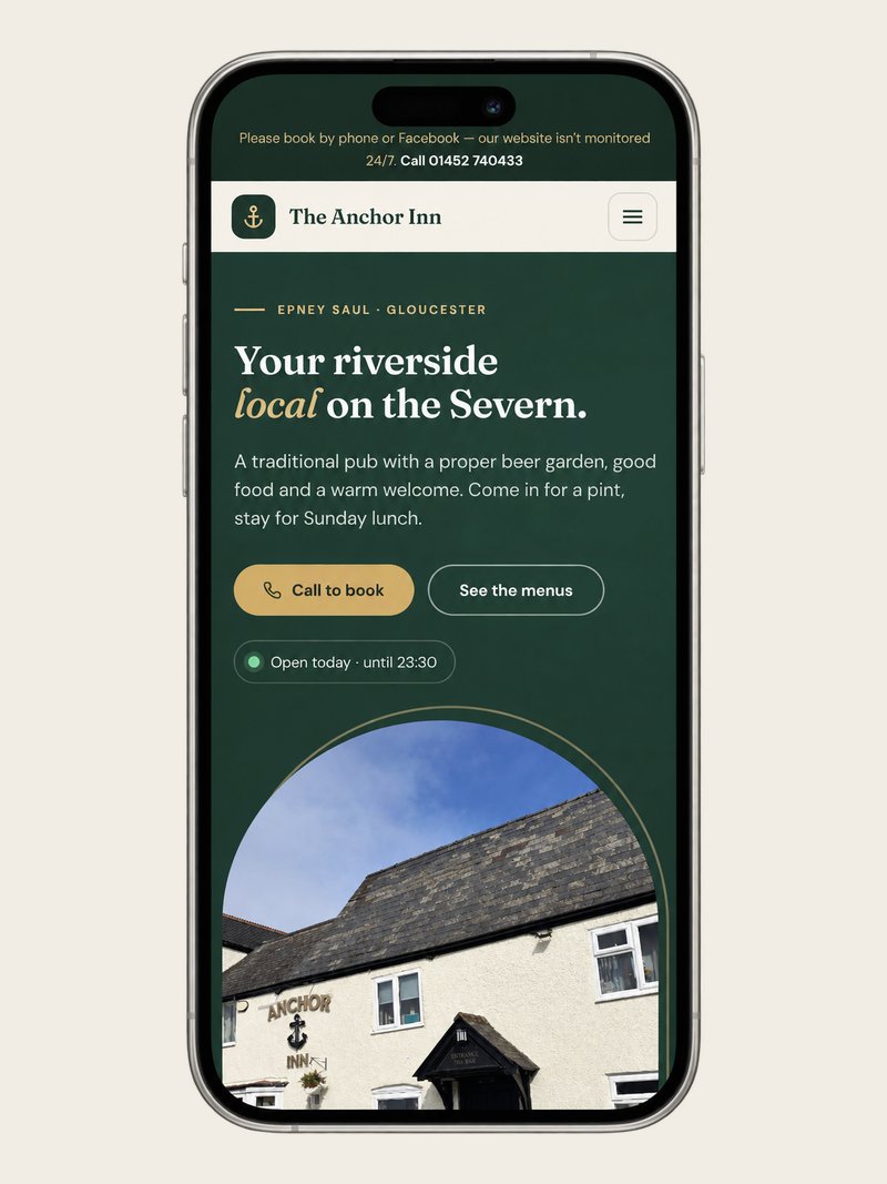 The Anchor Inn homepage shown on a mobile phone