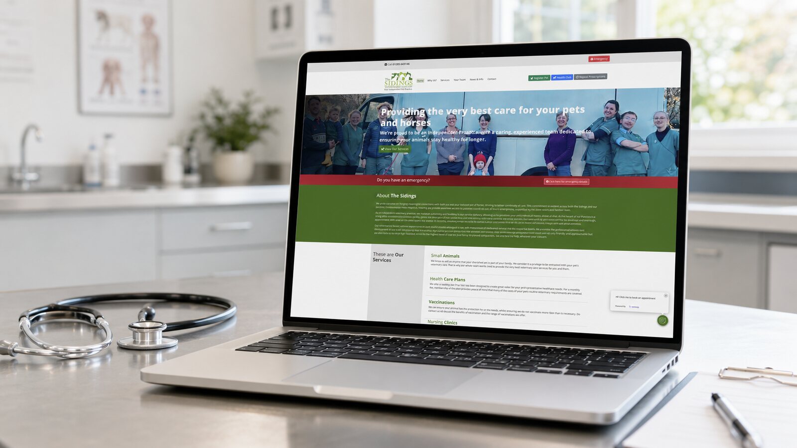 The Sidings Vets website shown on a laptop in the practice