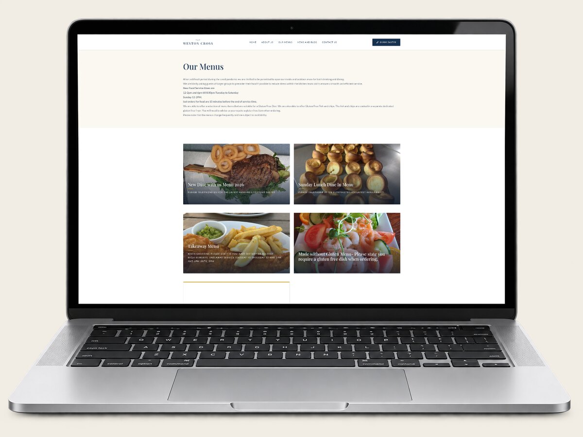 The Weston Cross menus page shown on a laptop